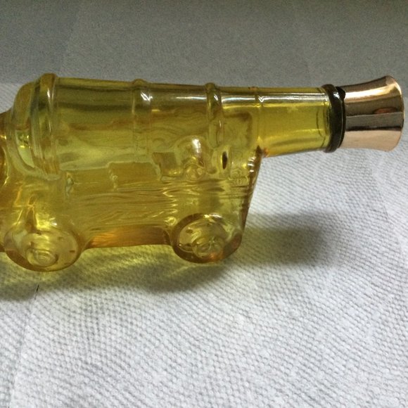 Glass bottle empty yellow amber cannon shape AVON? - Picture 3 of 5